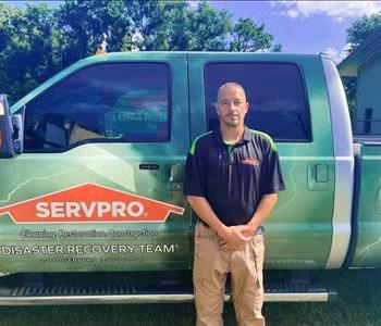 SERVPRO employee in front of work truck