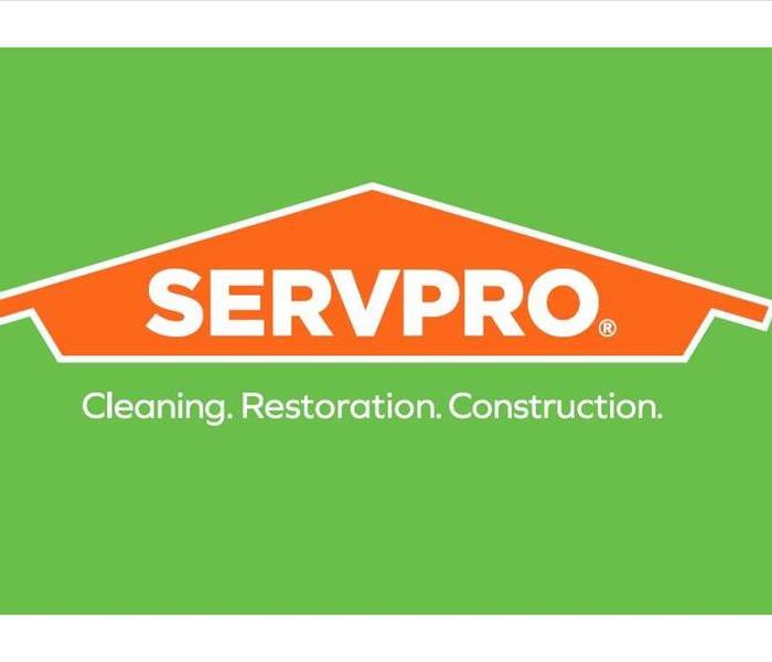 Orange House with SERVPRO written out
