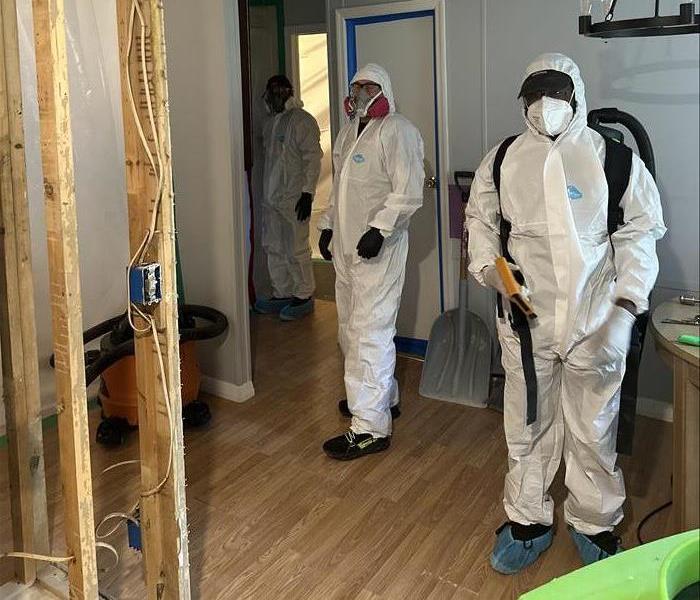SERVPRO team in PPE beginning work on a biohazard job